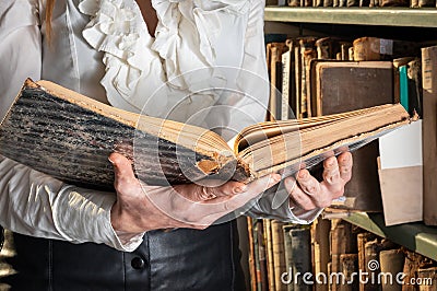 old book in woman`s hands. concept of wisdom, reading, imagination Stock Photo