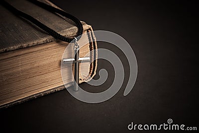 Old books with cross. religion concept. Stock Photo