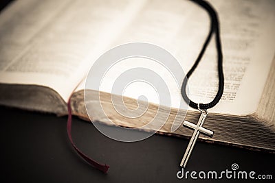 Old books with cross. religion concept. Stock Photo