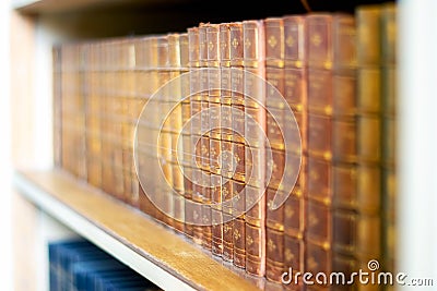 Old books on the shelf in the library Stock Photo
