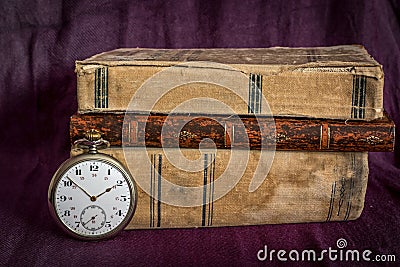 Old books and watch Stock Photo