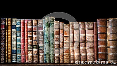 Old books on wooden shelf Stock Photo