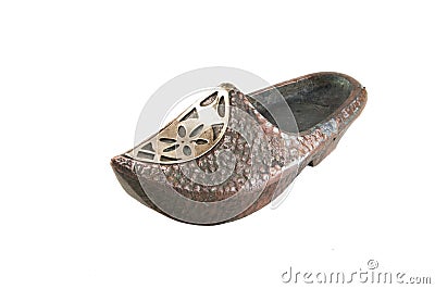 Old brass ashtray in form of shoe Stock Photo