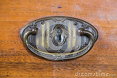 Old brass handle drawer Stock Photo