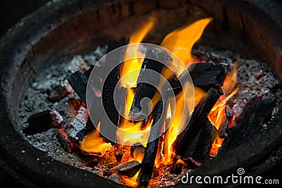 Old brazier stove flame Stock Photo