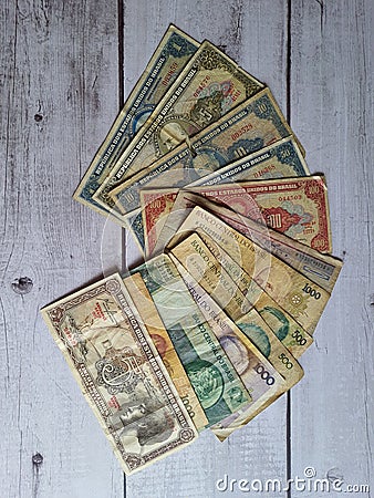 Old Brazil banknotes, out of circulation, obsolete, on a wooden table, Stock Photo