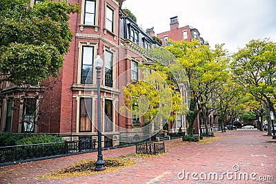 Traditional bick apartment building in a historic residential district on a cloudy autumn day Stock Photo