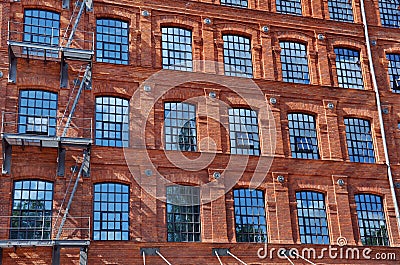 Old brick factory building rebuilt as hotel in Lodz Stock Photo