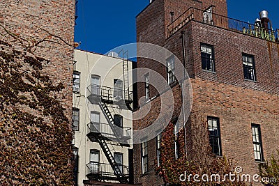 Old Brick Residential Buildings with Fire Escapes in Nolita of New York City Stock Photo