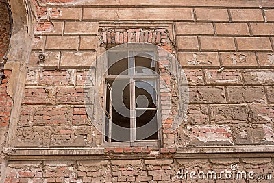 Old brick ruin wall with window Stock Photo