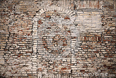 Old brick wall with blocked doorway as background Stock Photo