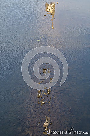 Old brick wall under water Stock Photo