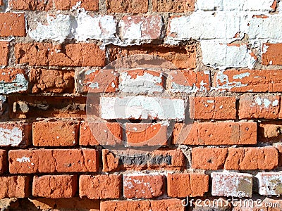 The old brick wall is made of red bricks Stock Photo