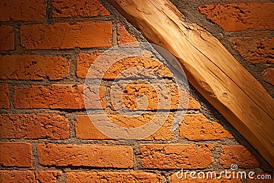 Old brick wall with wooden joist Stock Photo