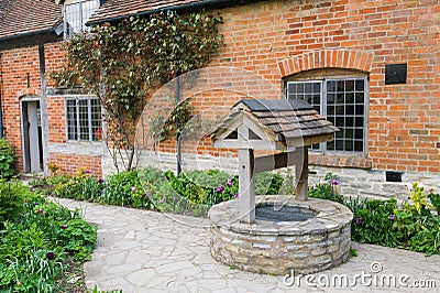 Old bricked well Stock Photo