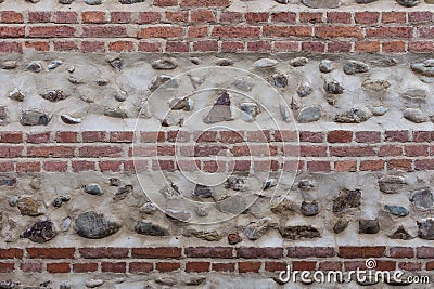 Old bricky wall with stones Stock Photo