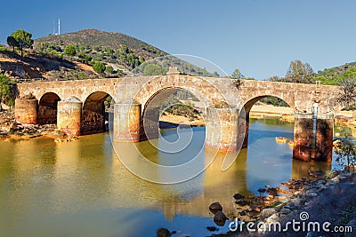 Old bridge in San Rafael on the Odiel river, Spain Stock Photo