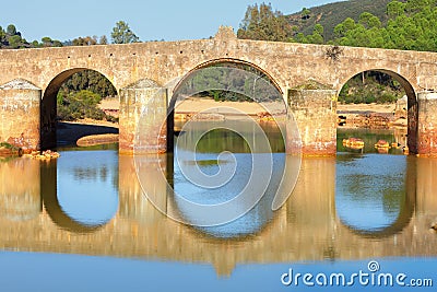 Old bridge in San Rafael on the Odiel river, Spain Stock Photo