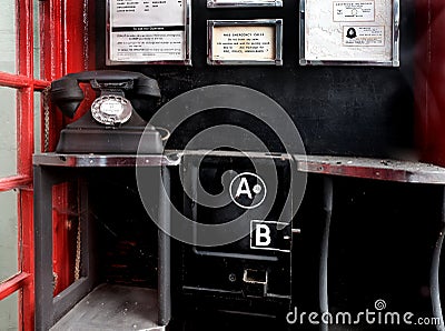 Old British red telephone kiosk. Editorial Stock Photo