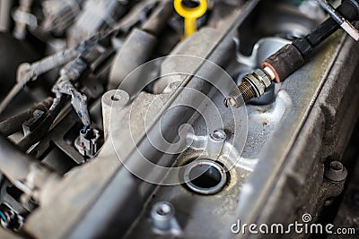 Old broken car spark plugs Stock Photo
