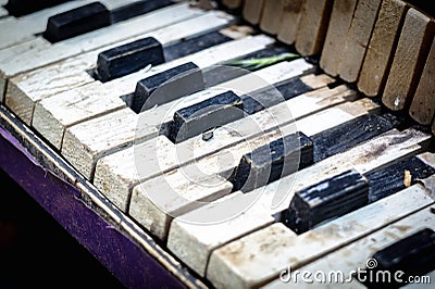 Old broken child piano Stock Photo