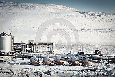 Old broken helicopters parked near an airfield in the Arctic Stock Photo