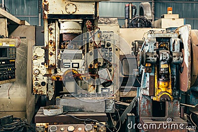 Old broken unused machine rusty steel in factory machinery workshop Stock Photo
