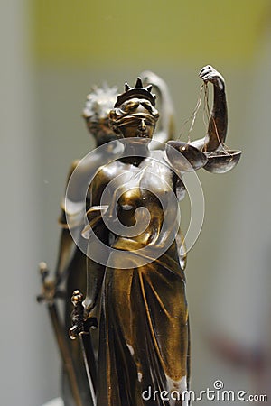 Old bronze statue of Justice Stock Photo