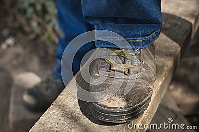 Old brown vintage walking boot on a style Stock Photo