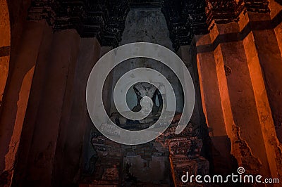 Old Buddha statue in Wat Chai Wattanaram temple in Ayutthaya Historical Park Stock Photo