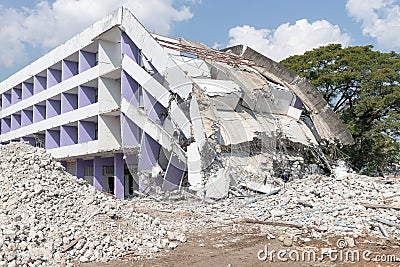 Old building collapse after earthquake wating to demolish by engineer Stock Photo