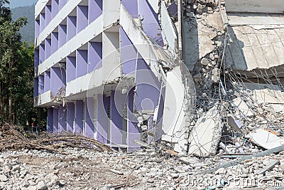 Old building collapse after earthquake wating to demolish by engineer Stock Photo