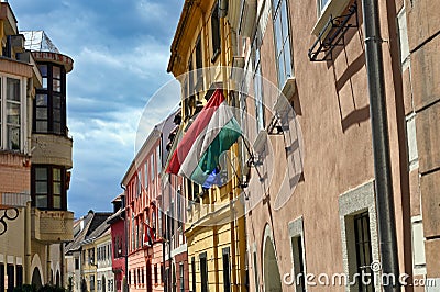 An old building with a Hungarian flag in Sopron Editorial Stock Photo