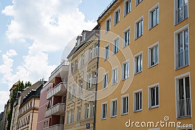Old building and new building, row of houses in Schwabing Stock Photo