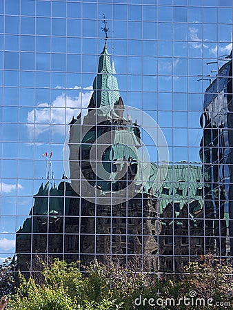 Old building reflected in new Stock Photo