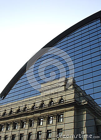 Old Building Reflection On A Modern Architecture Structure Stock Photo