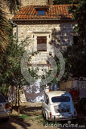 Old Building on street old town Dobrota Montenegro trip travel summer Editorial Stock Photo