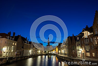 Old buildings in Brugges by night, Belgium Editorial Stock Photo