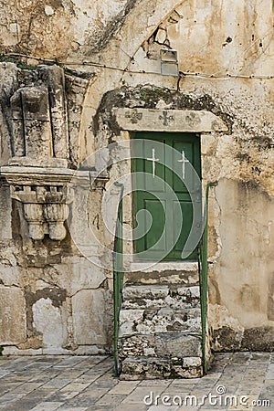 Old buildings in a Coptic part of the complex of the Basilica of the Holy Sepulchre in Jerusalem Stock Photo