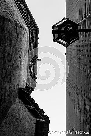 Old buildings with perspective to the sky black and white Stock Photo