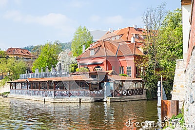 Old buildings and street view. Vltava river with glare. Travel photo 2019 Stock Photo