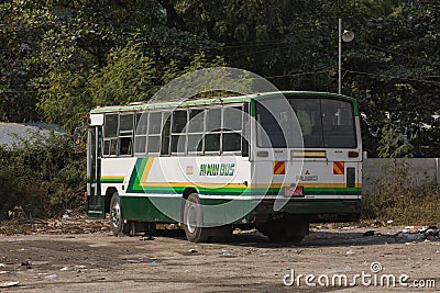 An old bus parked inside Chan Mya Shwe Pyi bus station Editorial Stock Photo