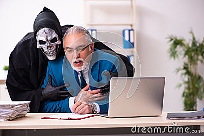 Old businessman employee getting deal with the devil Stock Photo
