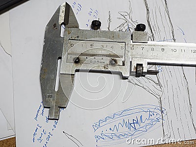 Old caliper and Micrometer on technical drawings Stock Photo