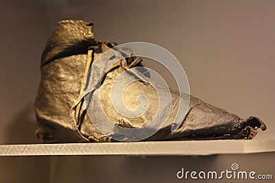 Old calzale. a single shoe of some ancient times preserved for the sake of history in the central library of Rotterdam Stock Photo