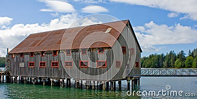 Old Cannery Building on Stilts Stock Photo