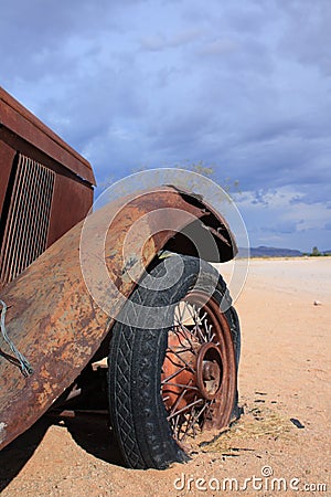 Old car with flat tire