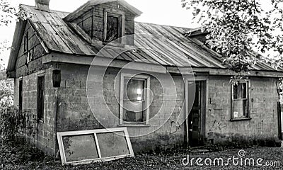 Old car garage showing its abandoned age Stock Photo