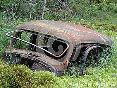 Old car in morass Stock Photo