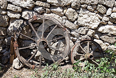 Old cart wooden wheels. Stock Photo